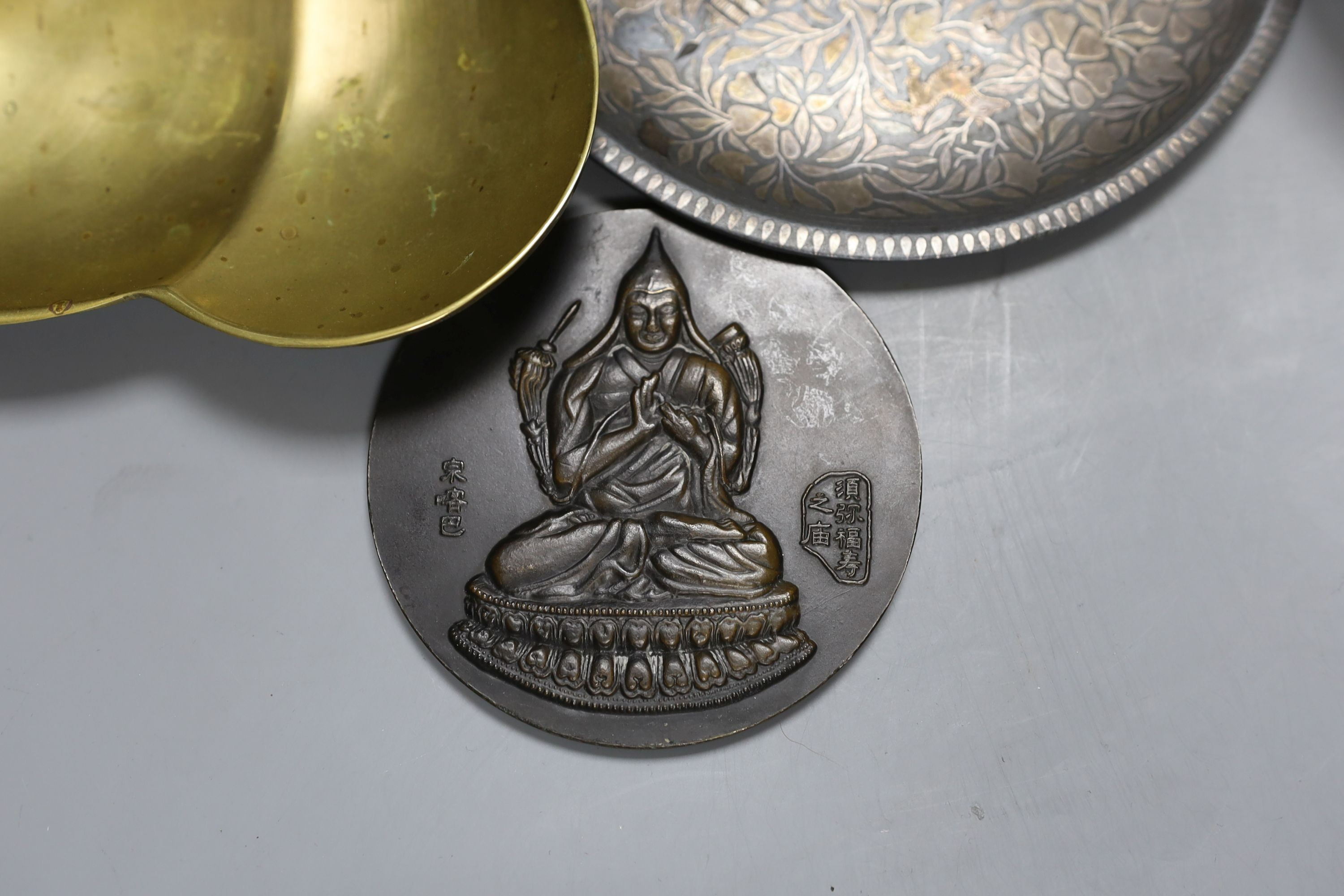 Metalware to include - a Sino-Tibetan bronze amulet, a Bidri ware dish, a Chinese paktong handwarmer Asian wood balls with inset coins etc